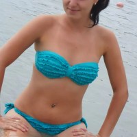 a band type bandeau bikini set with tight ruffle design in teal blue