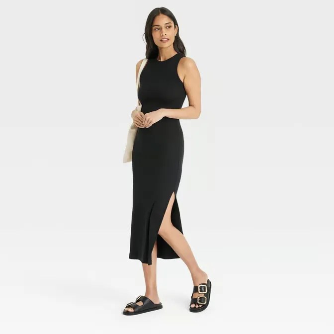 Women's Rib-Knit Maxi Bodycon Dress. A rib knit bodycon dress, Soft, stretchy fabric, Single layered construction, High neckline, Side slit, Pullover, Maxi length, Heavyweight, and sleeveless.