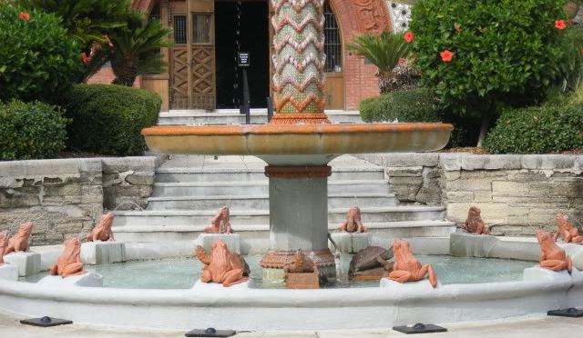 A fountain with frog sculptures stands out the Entrance to the university at Saint Augustine Florida.